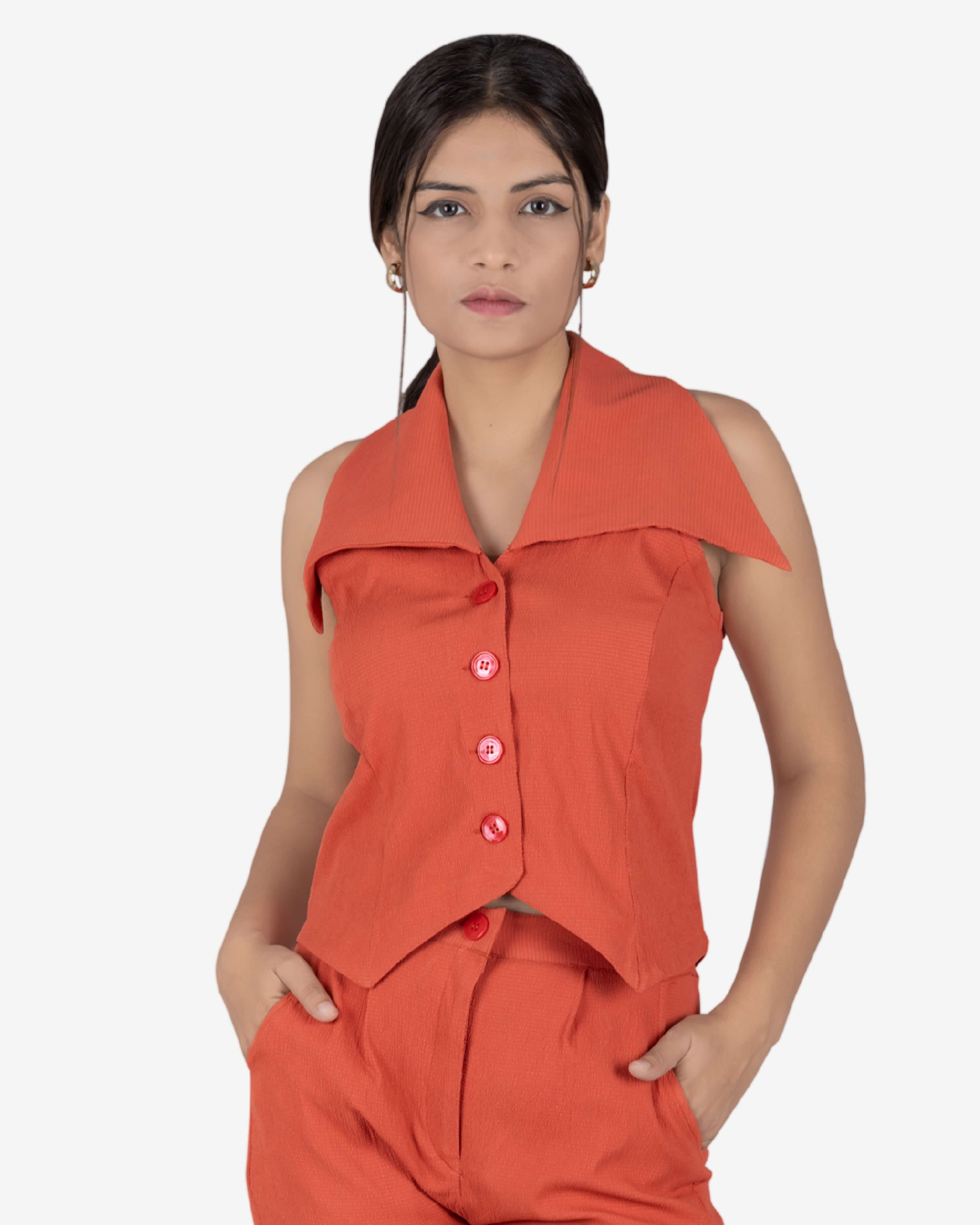 orange co-ord set sleeveless top asymmetrical hemline shoulder cut-outs high-waisted trousers straight-leg pants fashion statement trendy women girls -01